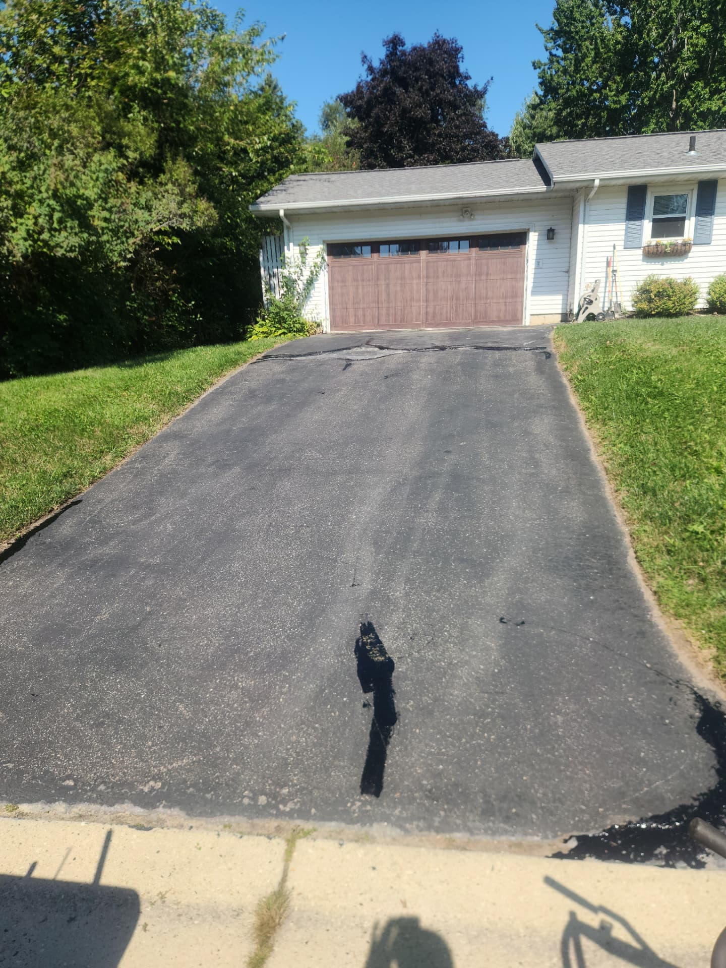 Driveway Sealcoat & Crack Fill — before
